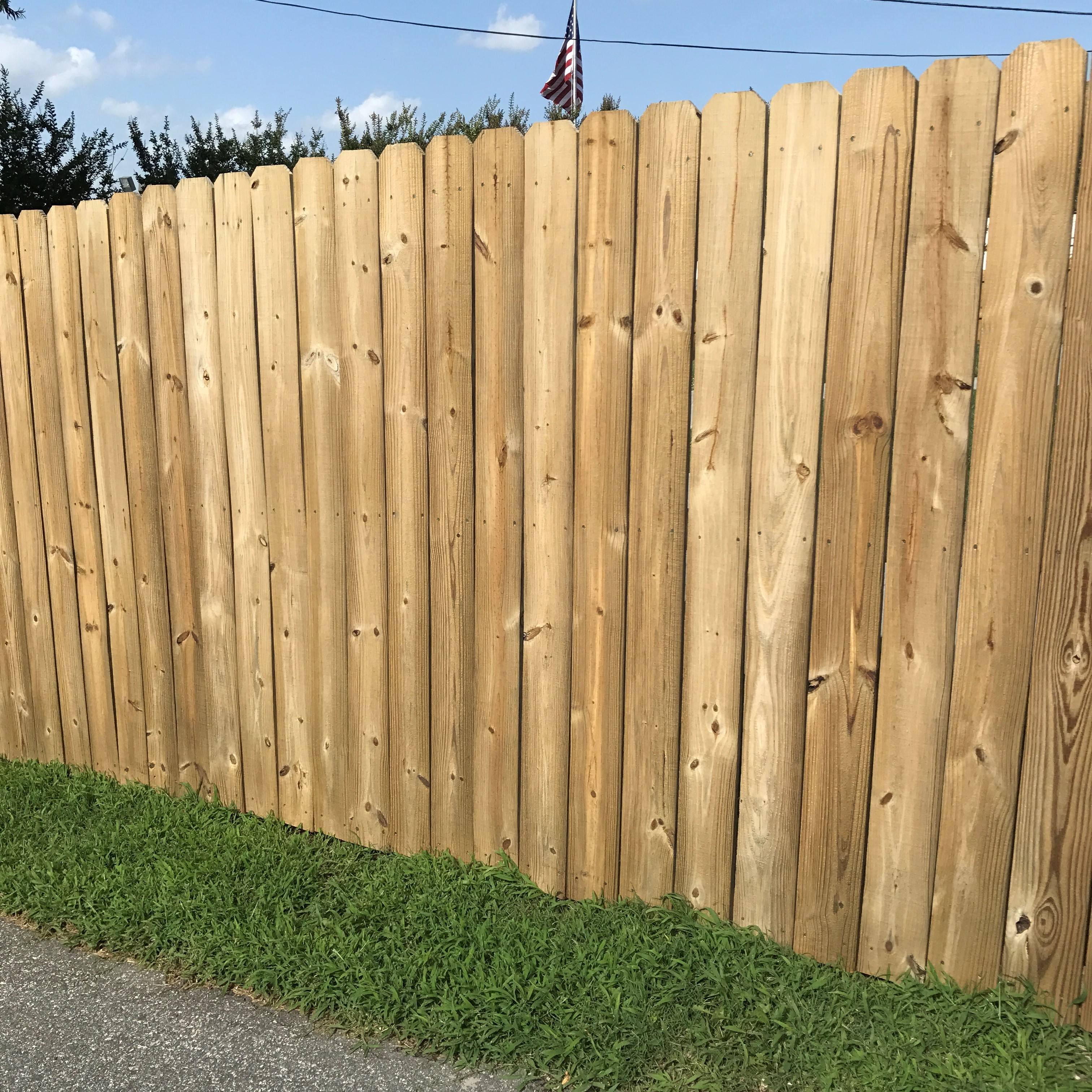 Fence with cedar stain